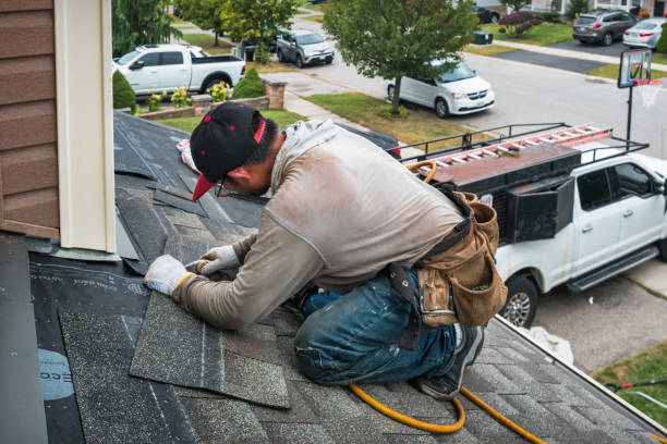 Professional Roofing technician working in New Paris, IN